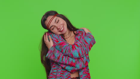 Young-happy-hippie-woman-girl-spread-hands-and-give-hug-embrace-to-you-on-chroma-key-background