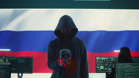 Conceptual-image-of-a-hooded-russian-hacker-creating-hazardous-alerts