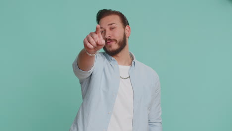 Lebanese-man-smiling-excitedly,-pointing-to-camera,-choosing-lucky-happy-winner,-indicating,-hey-you