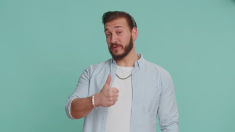 Lebanese-man-raises-thumbs-up-agrees-or-gives-positive-reply-recommends-advertisement-likes-good