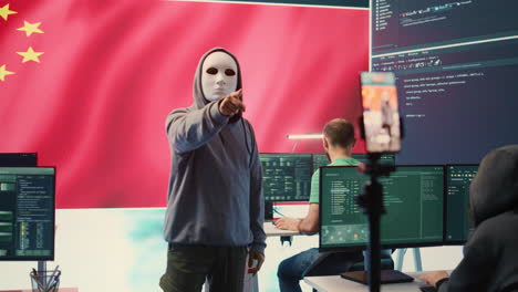 Anonymous-hacker-expert-in-a-Chinese-hacking-high-tech-office