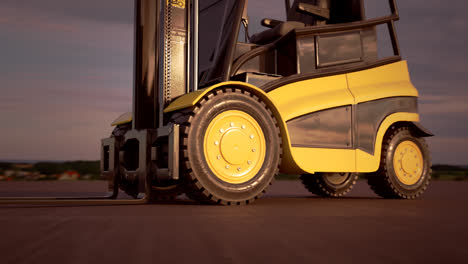 Modern-yellow-forklift-truck.-Professional-transportation-machine-is-using-hydraulic-machinery-to-load-heavy-cargo.-Tractor-moving-boxes-in-a-warehouse.-Industrial-and-logistic-concept.