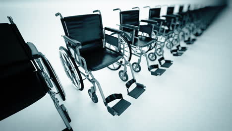 Standard-manual-wheelchairs-are-the-most-frequently-used-wheelchair,-increasing-mobility-of-invalids.-A-view-of-the-useful-medical-transportation-equipment-arranged-in-a-circular-array.-Loopable.-HD