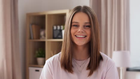 Portrait-of-Happy-Teenage-Girl-at-Home.people-concept-portrait-of-happy-teenage-girl-at-home