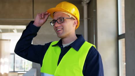 Builder-in-Helmet-with-Clipboard-Walking-Upstairs.architecture,-construction-and-building-concept-male-builder-in-helmet-and-safety-west-with-clipboard-walking-upstairs