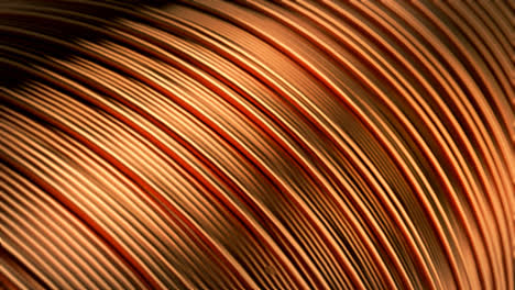 Close-up-of-pure-bright-copper-wire-on-the-spool.-Metallic-wires-are-used-in-the-electricity-and-electronics-industry-and-in-the-wire-manufacturing-process.-CG-loopable-animation.