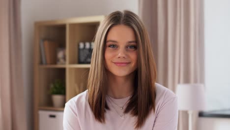 Portrait-of-Happy-Teenage-Girl-at-Home.people-concept-portrait-of-happy-teenage-girl-at-home