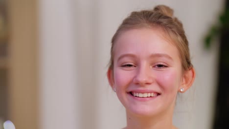 Portrait-of-Happy-Teenage-Girl-at-Home.people-concept-portrait-of-happy-teenage-girl-at-home