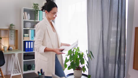 Confident-Businesswoman-Enters-Office-with-Financial-Reports