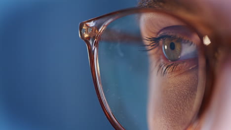 Woman-with-Glasses-Working-on-Computer,-Close-Up-Eye