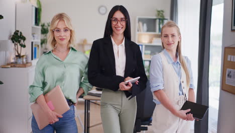 Portrait-of-Three-Beautiful-Businesswomen-Smiling