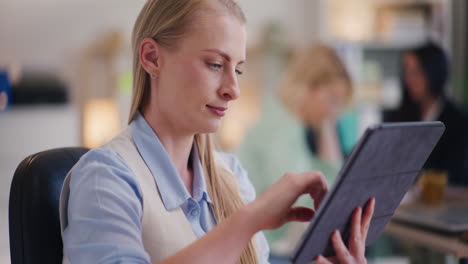 Positive-Woman-Checking-Bank-Balance-on-Digital-Tablet