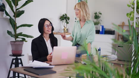 Two-Businesswomen-Happy-with-Financial-Results