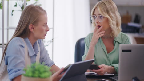 Two-Women-Discuss-Startup-Business-Project