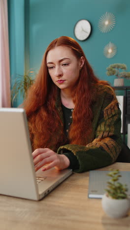 Displeased-sad-office-woman-using-laptop-working-loses-bad-news-computer-virus-fail-loss-game