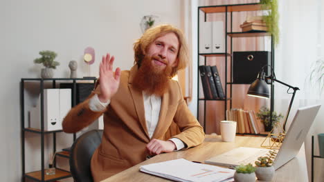 POV-of-business-man-employee-waves-hand-hi-gesture-greeting-welcomes-someone-online-office-webinar