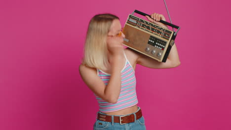 Happy-woman-listen-music-on-retro-tape-record-player,-disco-dancing,-fan-of-vintage-technologies