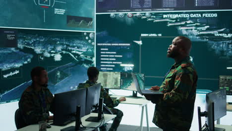 Military-specialists-work-in-a-high-tech-command-post-center