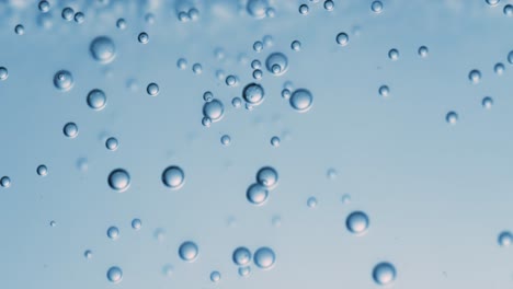 Many-water-bubbles-in-blue-water-close-up,-abstract-water-wave-with-bubbles-in-slow-motion.