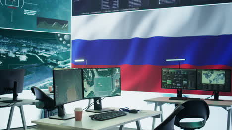 Empty-mission-control-center-with-the-russian-flag-on-big-screen