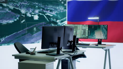 Empty-army-command-post-with-the-russian-flag-running-on-big-screen