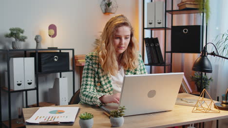 Businesswoman-employee-waves-hand-hi-gesture-greeting-welcomes-someone-at-camera-online-webinar