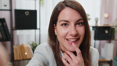 POV-webcam-view-business-woman-manager-looking-at-camera-talking-online-meeting-office-conference