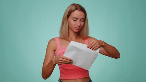 Woman-open-envelope-letter-reads-it-feel-happy,-career-growth-advance-promotion,-bank-loan-approve