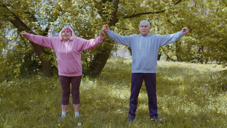 Athletic-fitness-senior-sport-man-woman-grandparents-training-cardio-workout-in-park-at-morning