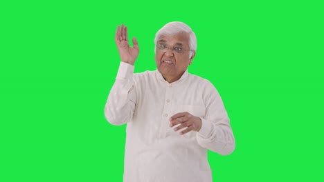 Indian-old-man-flying-a-bee-Green-screen