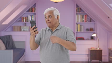 Angry-Indian-old-man-shouting-on-video-call