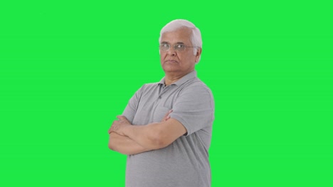 Portrait-of-Confident-Indian-old-man-standing-crossed-hands-Green-screen