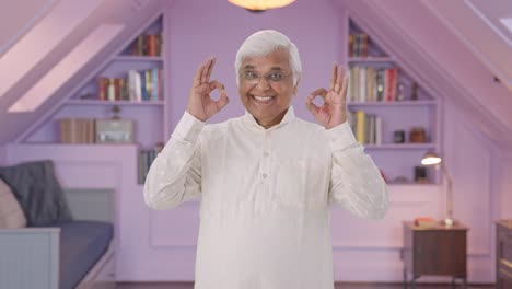 Happy-Indian-old-man-showing-okay-sign