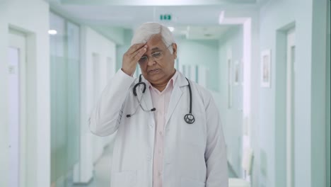 Stressed-and-tensed-Indian-senior-doctor