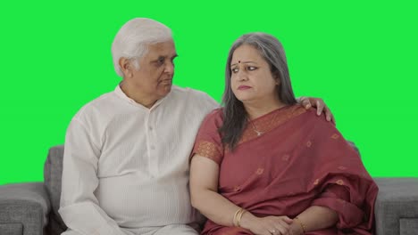 Serious-Old-Indian-couple-staring-Green-screen