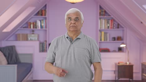 Angry-Indian-old-man-shouting-to-someone