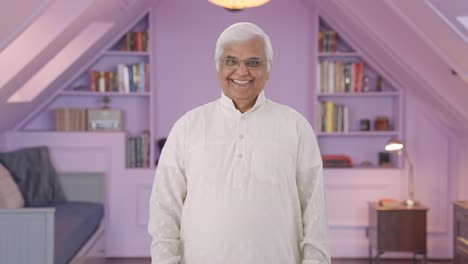 Happy-Indian-old-man-smiling-at-the-camera