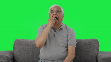 Sleepy-and-tired-Indian-old-man-yawning-Green-screen