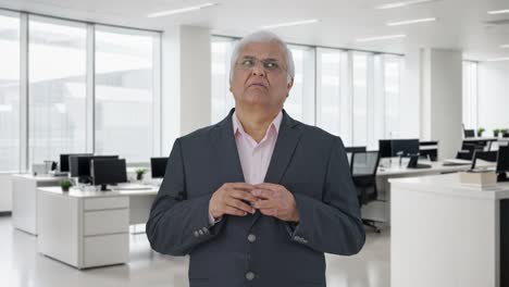 Confused-Indian-senior-manager-thinking