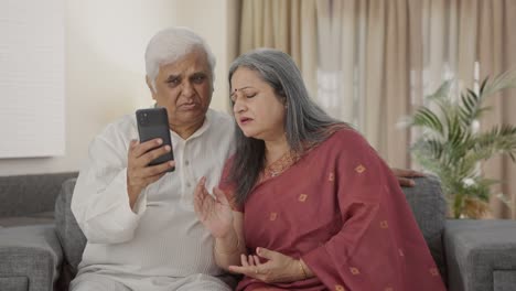 Old-Indian-couple-talking-on-video-call