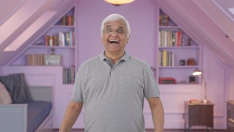 Happy-Indian-old-man-getting-a-surprise