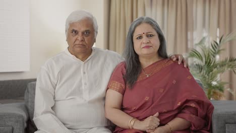 Angry-Indian-Old-couple-looking-at-the-camera