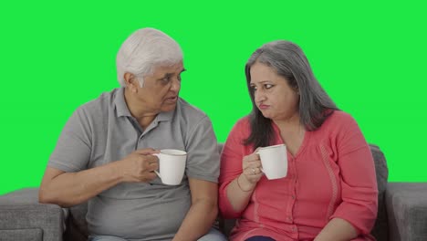 Indian-old-couple-drinking-tea-and-talking-Green-screen