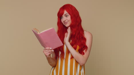 Redhead-woman-reading-funny-interesting-fairytale-story-book,-leisure-hobby,-education,-learning