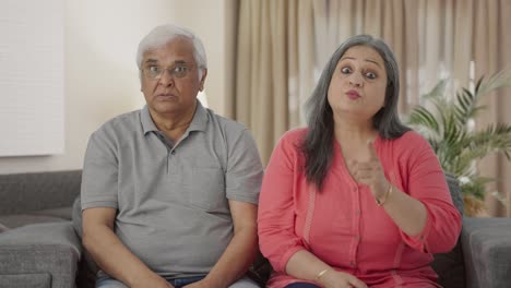 Angry-Indian-old-couple-shouting-on-someone