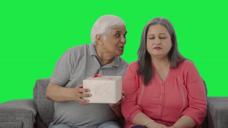 Old-Indian-husband-surprises-wife-with-a-gift-Green-screen