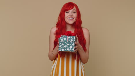 Redhead-winner-girl-receive-gift-box-bonus,-birthday-surprise,-expressing-great-happiness-amazement