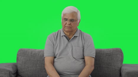 Angry-Indian-old-man-looking-at-someone-Green-screen