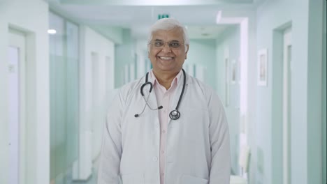 Happy-Indian-senior-doctor-getting-ready