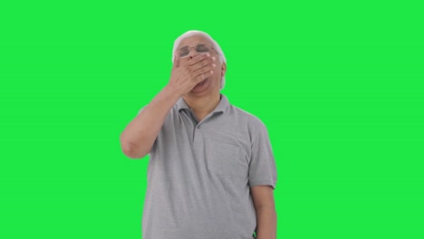 Sleepy-and-tired-Indian-old-man-yawning-Green-screen